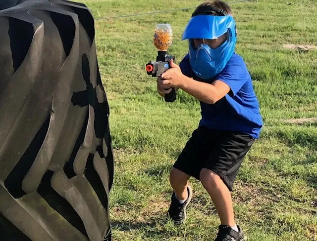 Gellyball player aiming a blaster