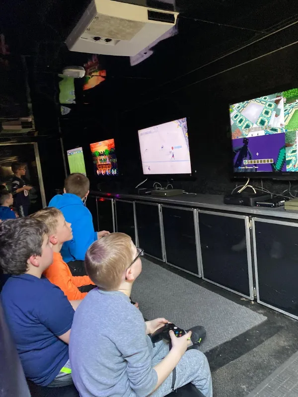 Inside the Rolling Video Games truck with HD screens