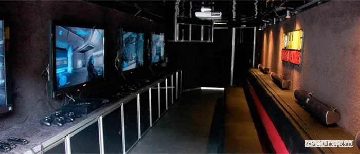 Stadium seating and screens inside the game truck