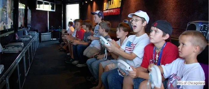 Kids playing video games inside the truck