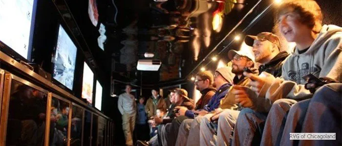 Birthday party guests gaming inside the truck